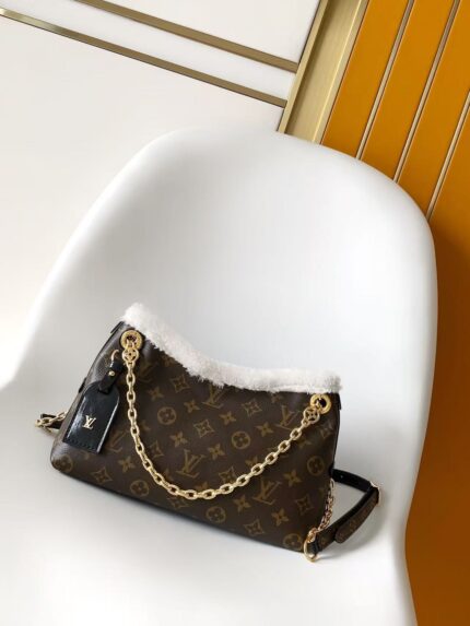 Louis Vuitton CARRYALL BB Handbag cozy shearling trim